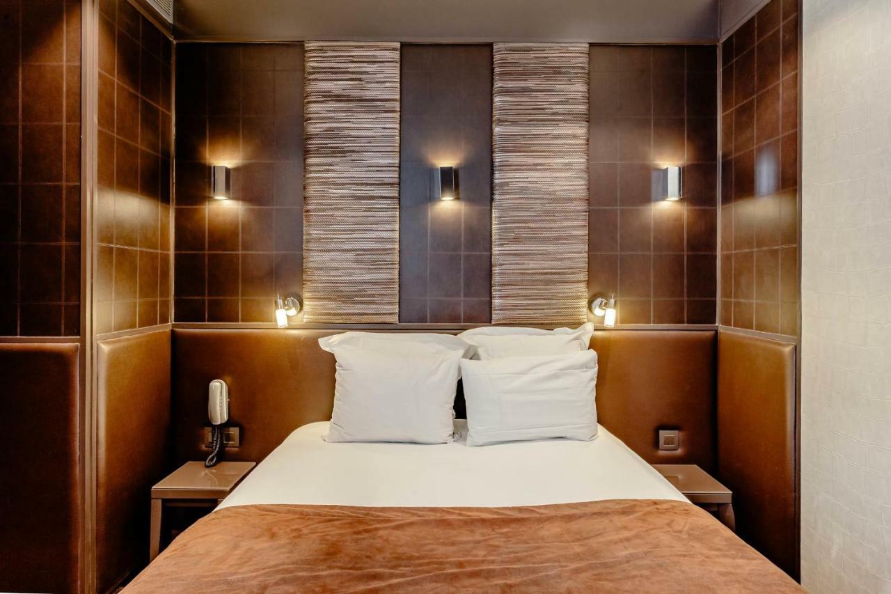 L'Adresse Hotel Paris Exterior foto