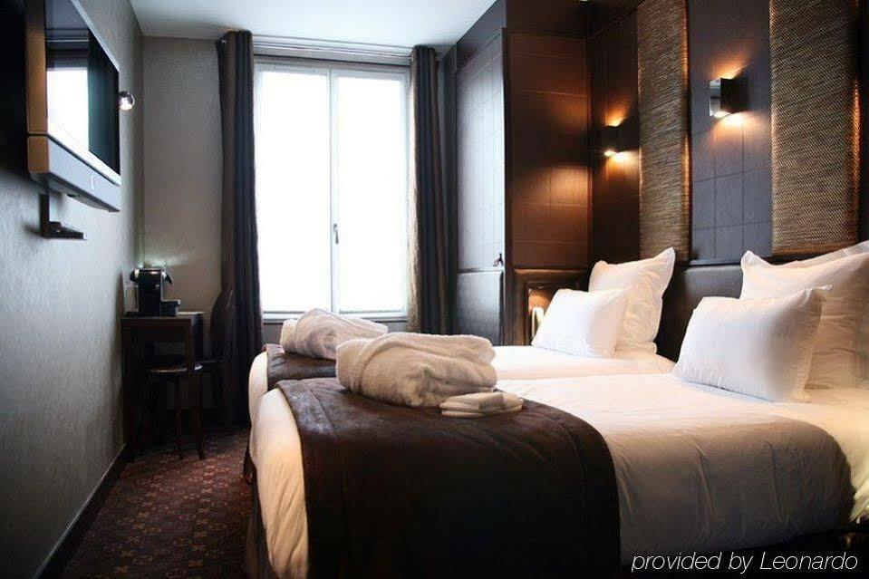L'Adresse Hotel Paris Exterior foto